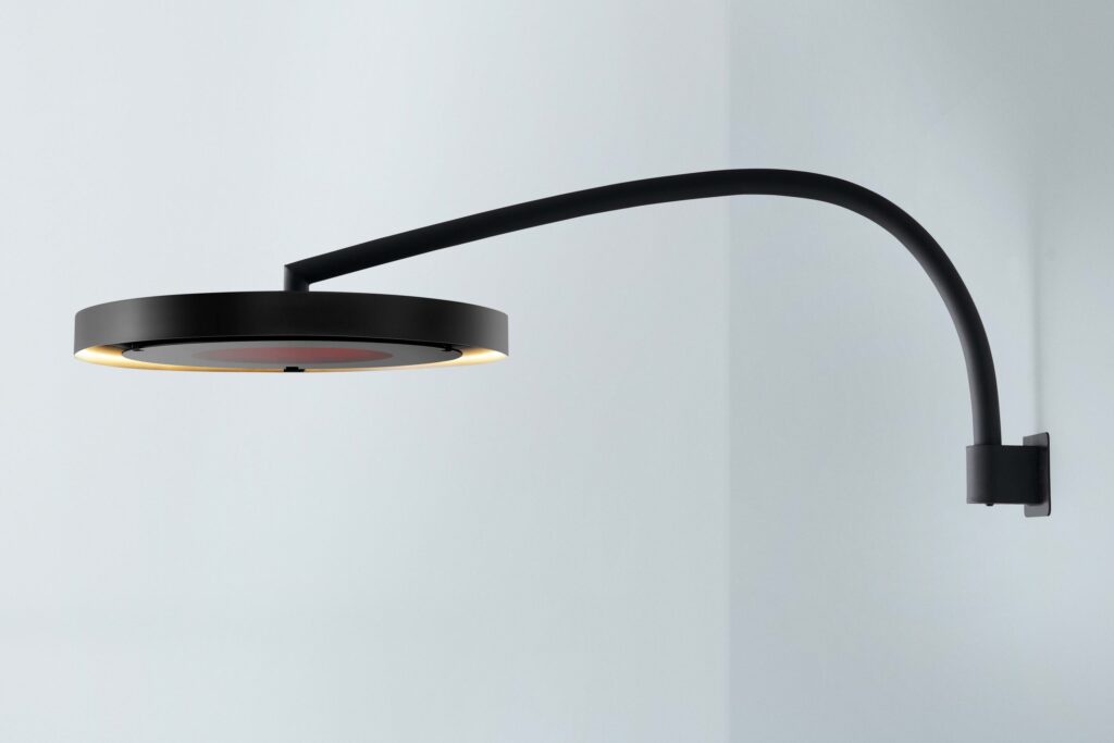 Calefactor eléctrico curvo montado en pared